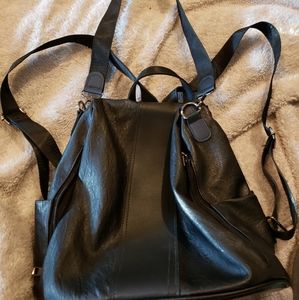 Black backpack purse with hidden opening